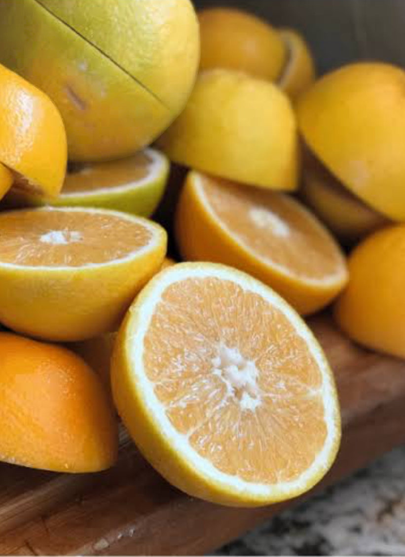 Juicing Oranges-The Village Grocer Club